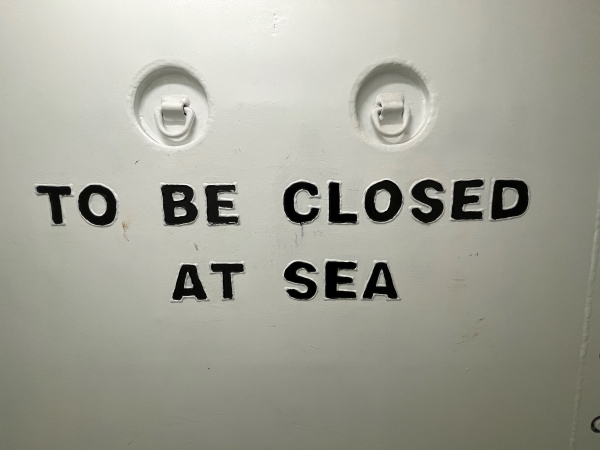 Curious metal signage on the GENCA cargo ship. "TO BE CLOSED AT SEA"